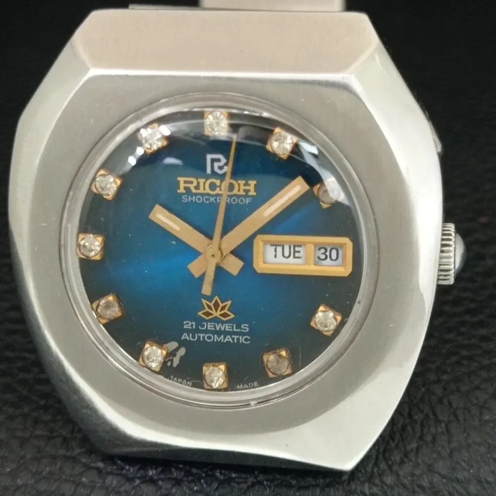 Vintage 1975 Ricoh Automatic Mens Silver Watch W/daydate & Blue accents
